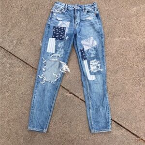 American Eagle blue jeans with patches. Straight leg, size 0 long